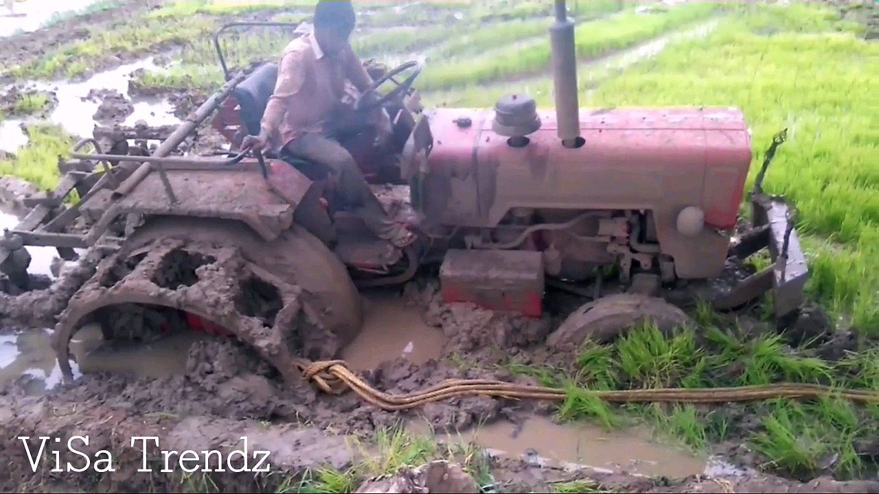 How to Pull Out a Tractor from a Mud Pit...Smart Idea...!!!!!