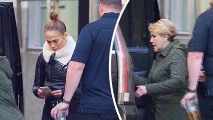 Jennifer Lopez displays her pert derriere while heading to the gym with her mother in New York