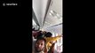Window breaks in severe turbulence on Air India flight