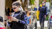 Kylie Jenner sparks engagement rumours as she sports eye-catching diamond ring on her wedding finger while out and about in Los Angeles.