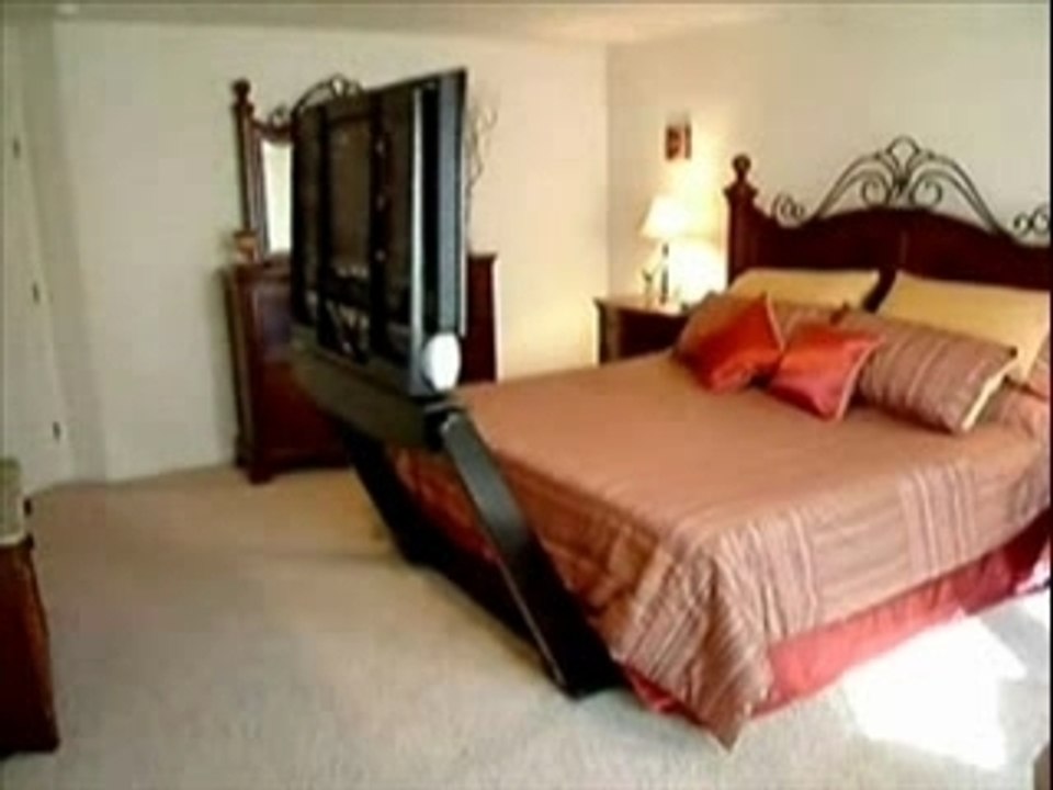 Un écran plasma au lit