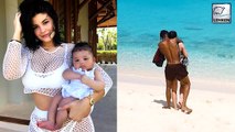 Kylie Jenner Cuddles With Stormi While On Vacation With Travis Scott