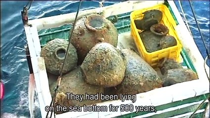 Travail archéologique sur la barge