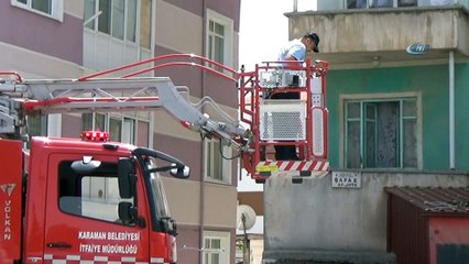 İki çocuğuyla balkonda mahsur kalan Afgan uyruklu kadını itfaiye kurtardı