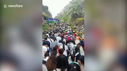 Crowds of tourists brought to a standstill on China's Mount Tai during holidays