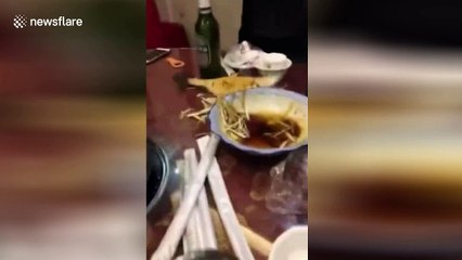 Cooked fish comes back to life on restaurant table