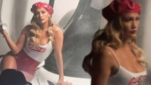 Jennifer Lopez bares her booty in PVC hot pants while spray painting $1m McLaren car in Guess ad.