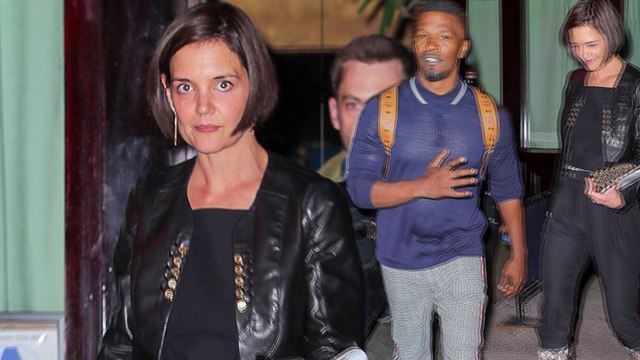 Katie Holmes and Jamie Foxx enjoy rare date night in New York as they leave restaurant separately.