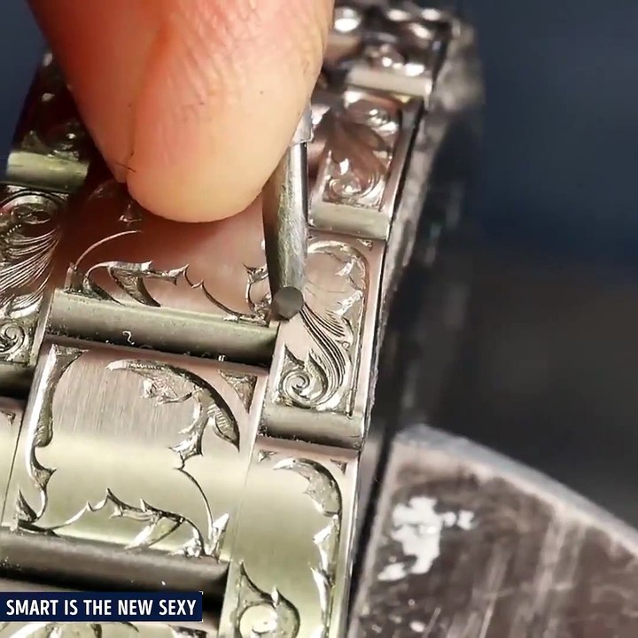 Hand-engraved Rolex Submariner. via Bram Ramon, BRAM RAMON Engraving Creations, instagram.com/bramramon_engraver
