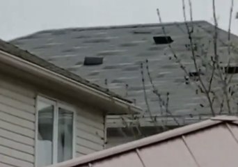 Shingles Seen Flapping as High Wind Blasts, Thunderstorms Rattle Ontario