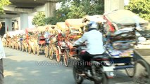 Rickshaw puller drags along 25 rickshaws - only in India!