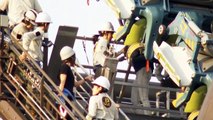WATCH: Rescuers in action at Universal Studios Japan after a rollercoaster stalled, leaving riders hanging 20-30m above ground.(: APTN)