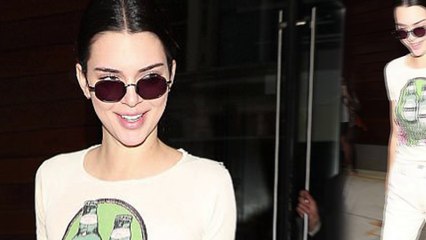 Kendall Jenner shows off trim figure in tight floral Heineken tee.