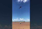 Helicopter Pulls Stranded Boat Back to Water