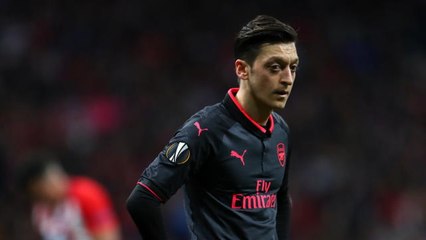 Ozil isn't choosing his games, he's injured - Wenger