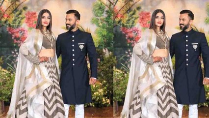 Télécharger la video: Sonam Kapoor - Anand Ahuja Black & White Dress में पहुंचे Reception Party में | BoldSky