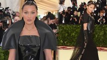 Bella Hadid punks up her Sunday Best as she teams black lace veil with PVC and leather for Met Gala.
