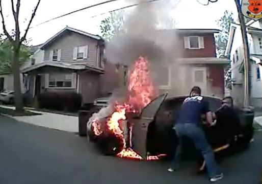 NJ Police Forced to Drag Driver From Burning Vehicle