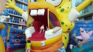 Outdoor playground for kids with BOB SPONGE, slides and more funny inflatable toys