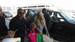 Jessica Simpson Dons Baggy Track Pants While Catching A Flight With Her Adorable Little Ones