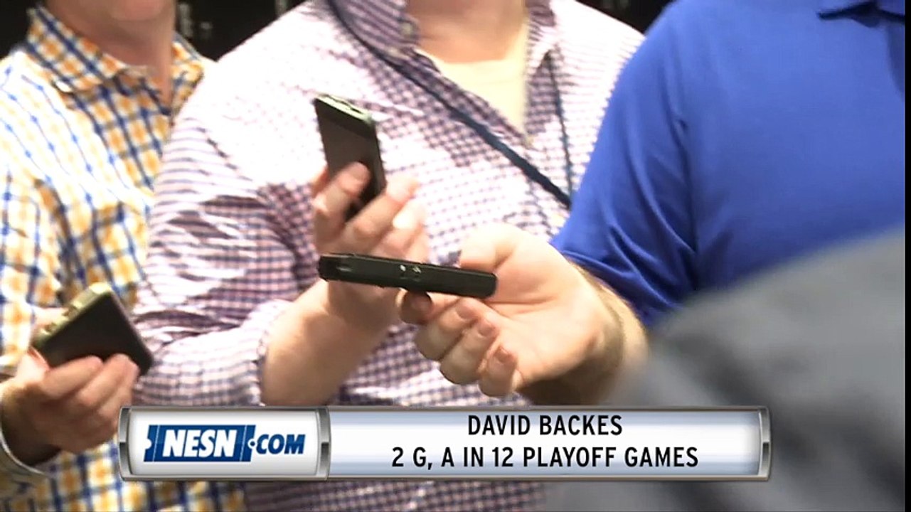 David Backes addresses media during exit interview