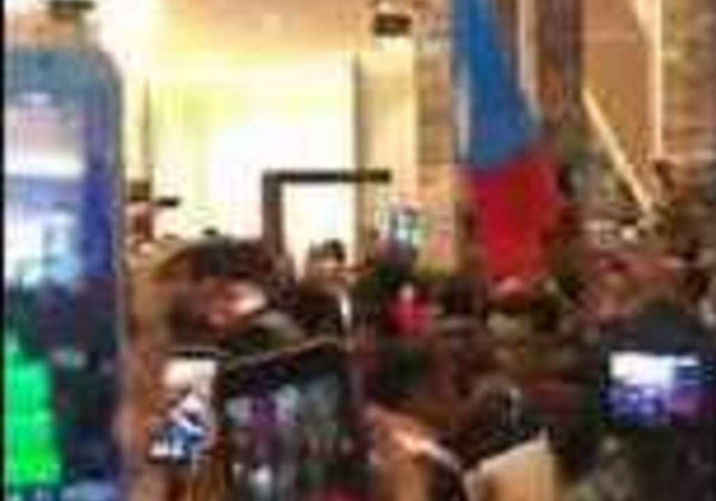 Supporters of New Prime Minister Cheer, Wave Malaysian Flags