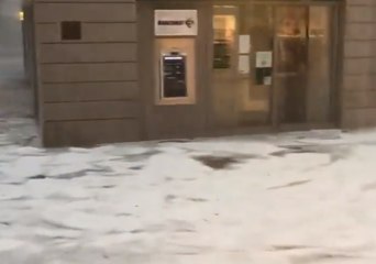Heavy Rain and Hail Flood Street in Milan Suburb