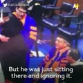 The University of Florida's president apologized to students who were aggressively pulled off stage while they were graduating.