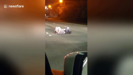 Moment two men filmed fighting in middle of Liverpool A-road