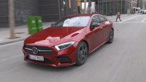 Mercedes-Benz CLS 450 4MATIC in Red metallic Driving in the city