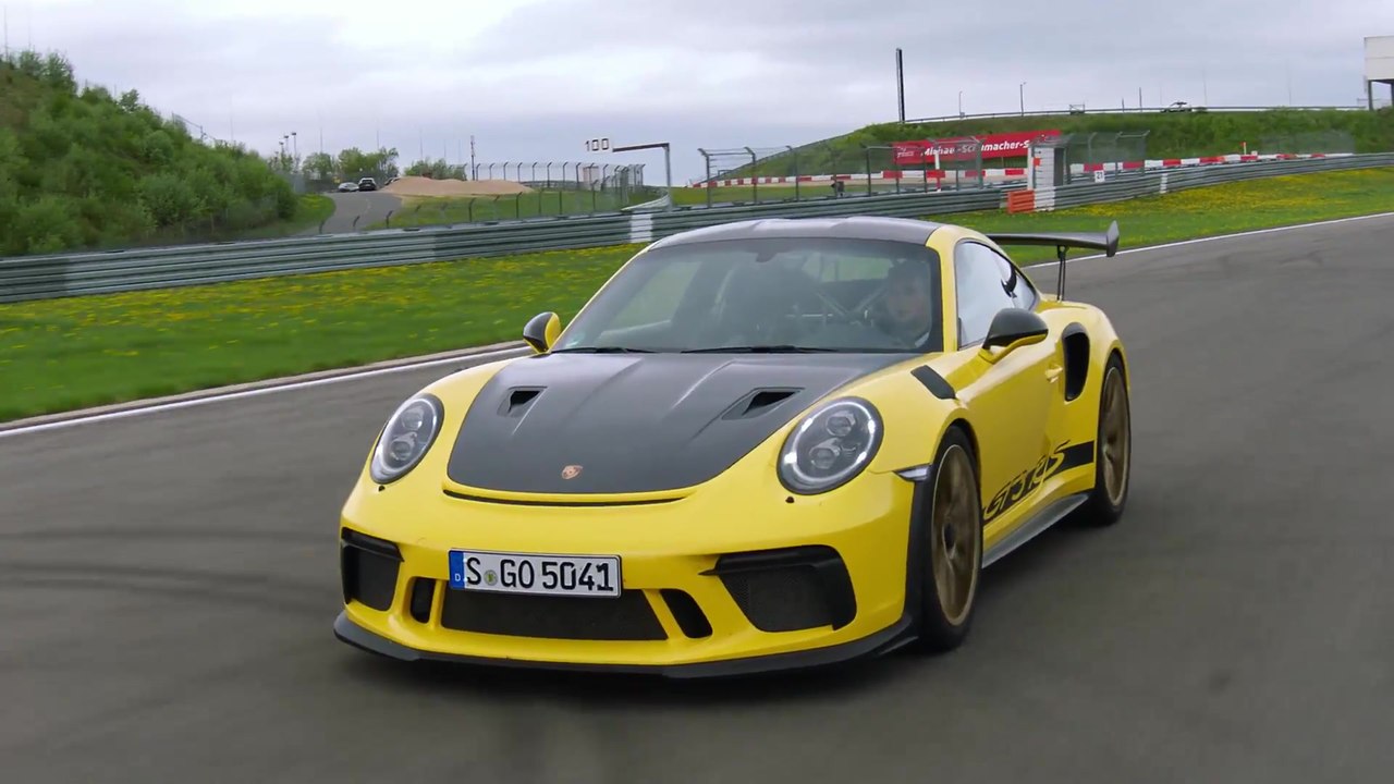 The new Porsche 911 GT3 RS Racing Yellow Driving Video