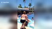 American man parades around pool in 'Borat'-style mankini after losing bet