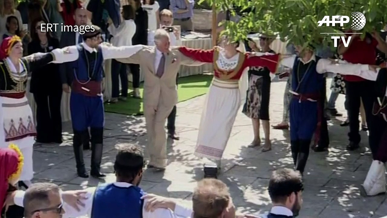 Prince of Wales Charles and Duchess of Cornwall dance in Crete