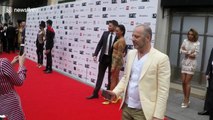 Host Mel B poses on the red carpet at the 2018 British LGBT Awards