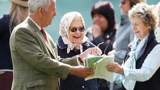 Queen wears £70 quilted jacket available from DEBENHAMS