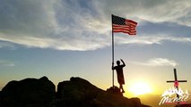 Replacing Torn Old American Flag On Mountaintop