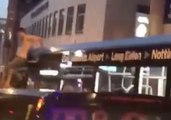 England Fan Celebrates World Cup Win on Roof of Nottingham Bus