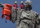 Activists Place Life Jacket on Christopher Columbus Statue in Barcelona