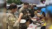 Foreign rescuers taste Thai food during cave rescue