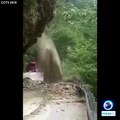 See how huge landslide cuts off road in southwest China