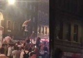 England Fan Scales Lamppost After World Cup Penalty Shootout Win