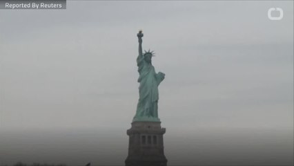 Protester Climbs Statue Of Liberty, Leads To Evacuation
