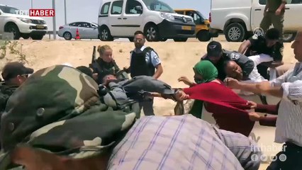 İsrail askerleri Filistinli kadının başörtüsünü yırtarak yerde sürükledi