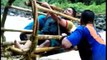 World's most dangerous school run! Kids cross flooded river in a bamboo basket