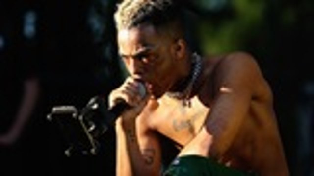 Law Enforcement Issues Arrest Warrant for ‘Person of Interest’ in XXXTentacion Death | Billboard News
