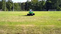 Having Fun Playing With His New Powered Ride On Pacific Sport ATV 12V