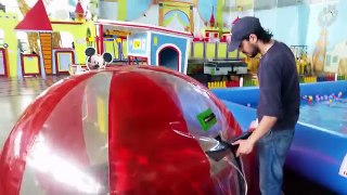 Kids having fun and playing in walking water ball. Funny video from KIDS TOYS CHANNEL