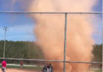Dust Devil Whirls Through Ontario Softball Match