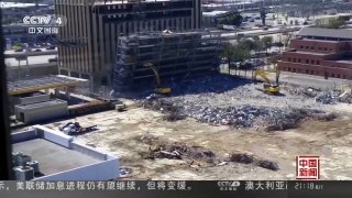 [中国新闻]美国：建筑意外倒塌 挖掘机操作员死里逃生