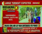 Karnataka goes to polls today; BSY, Sadananda Gowda casts their votes